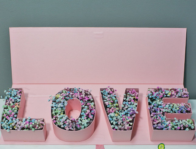 Box "LOVE" with multi-colored gypsophila photo